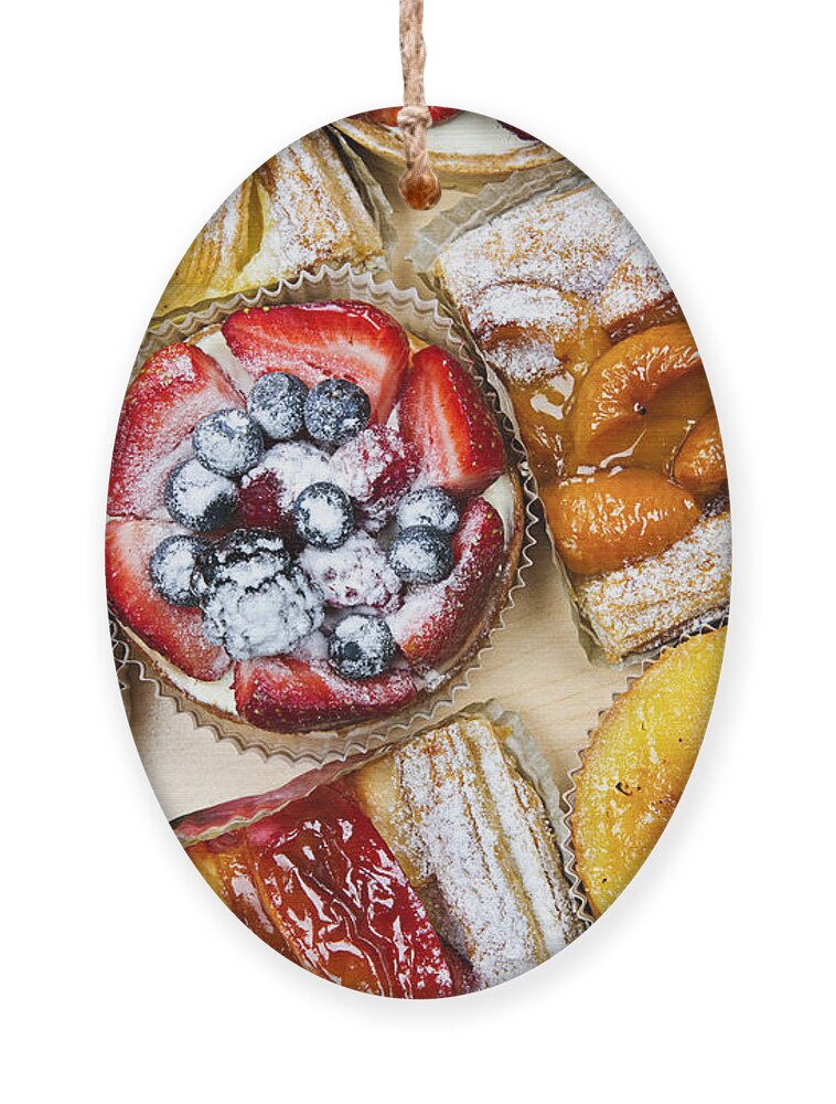 Pastries Ornament featuring the photograph Tarts and pastries by Elena Elisseeva