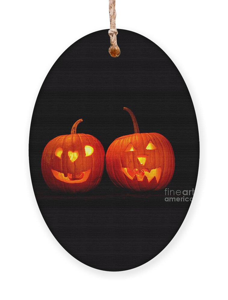 Halloween Ornament featuring the photograph Two Carved Jack O Lantern Pumpkins by James BO Insogna