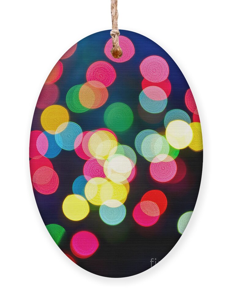 Blurred Ornament featuring the photograph Blurred Christmas lights 1 by Elena Elisseeva