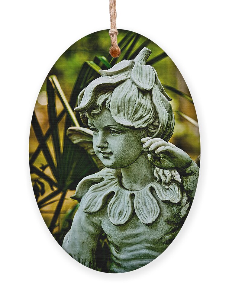 Statue Ornament featuring the photograph In The Garden by Christopher Holmes