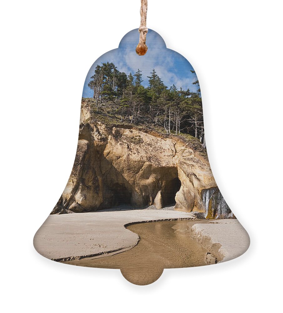 Beach Ornament featuring the photograph Waterfall Flowing into the Pacific Ocean #2 by Jeff Goulden