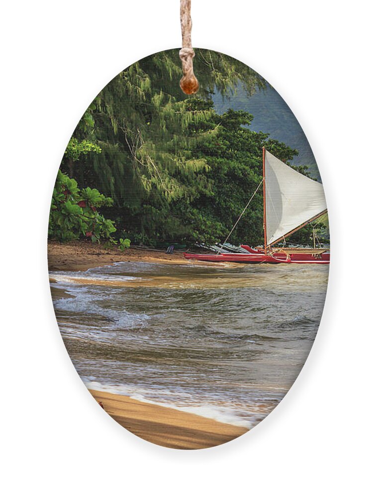 Sailboat Ornament featuring the photograph A Sailboat In Hanalei Bay by James Eddy