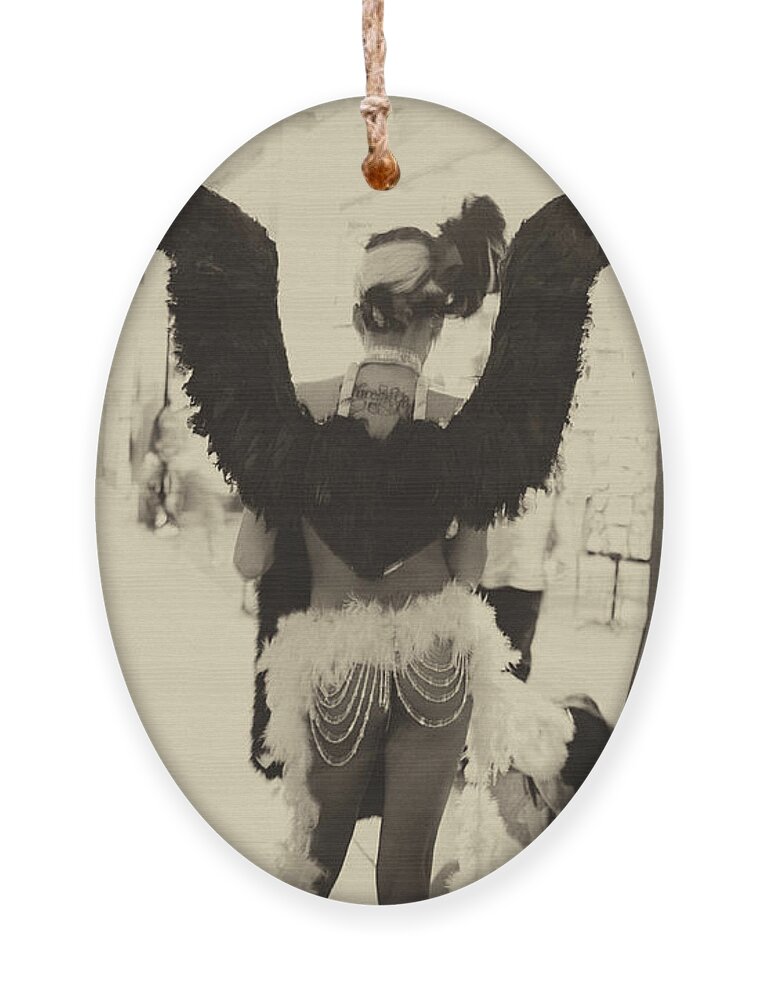  Ornament featuring the photograph Angels of Las Vegas by Lora Lee Chapman
