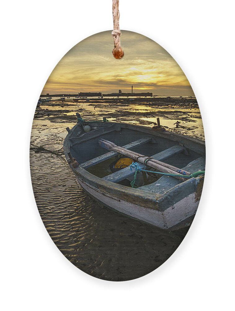 12mm F2 Ornament featuring the photograph Beached Boat on La Caleta Cadiz Spain by Pablo Avanzini