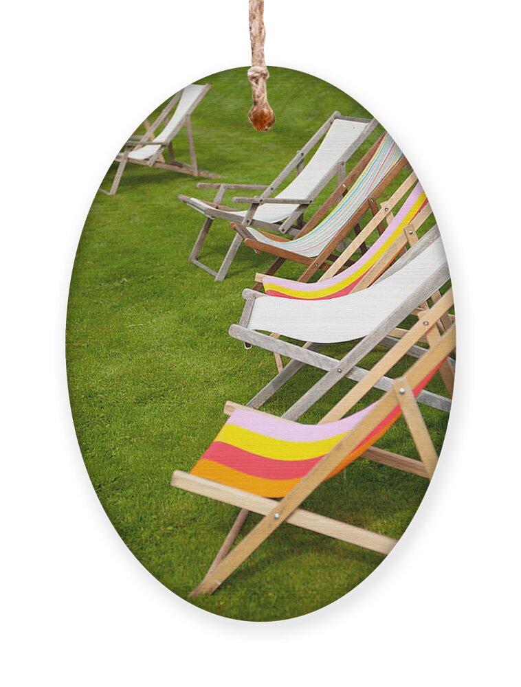 Deck Chairs Ornament featuring the photograph Deck Chairs by Helen Jackson