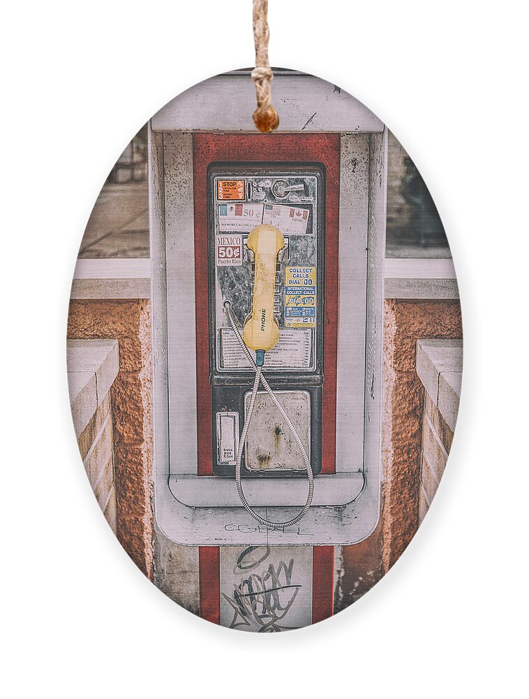 Pay Phone Ornament featuring the photograph East Side Pay Phone by Scott Norris