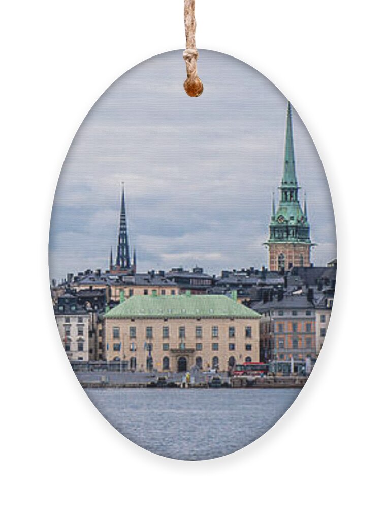 Gamla Stan Stockholm's Entrance By The Sea Ornament featuring the photograph Gamla Stan Stockholm's entrance by the sea by Torbjorn Swenelius