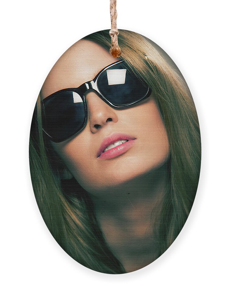 Young Ornament featuring the photograph Girl with Sunshades by Carlos Caetano