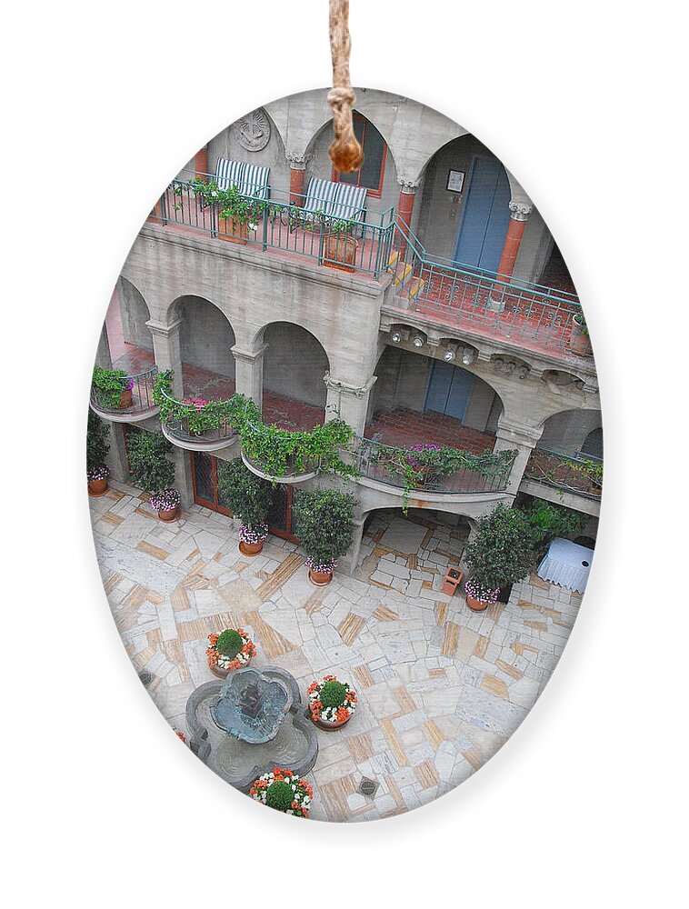 Mission Inn Ornament featuring the photograph Mission Inn Courtyard Overlook by Amy Fose