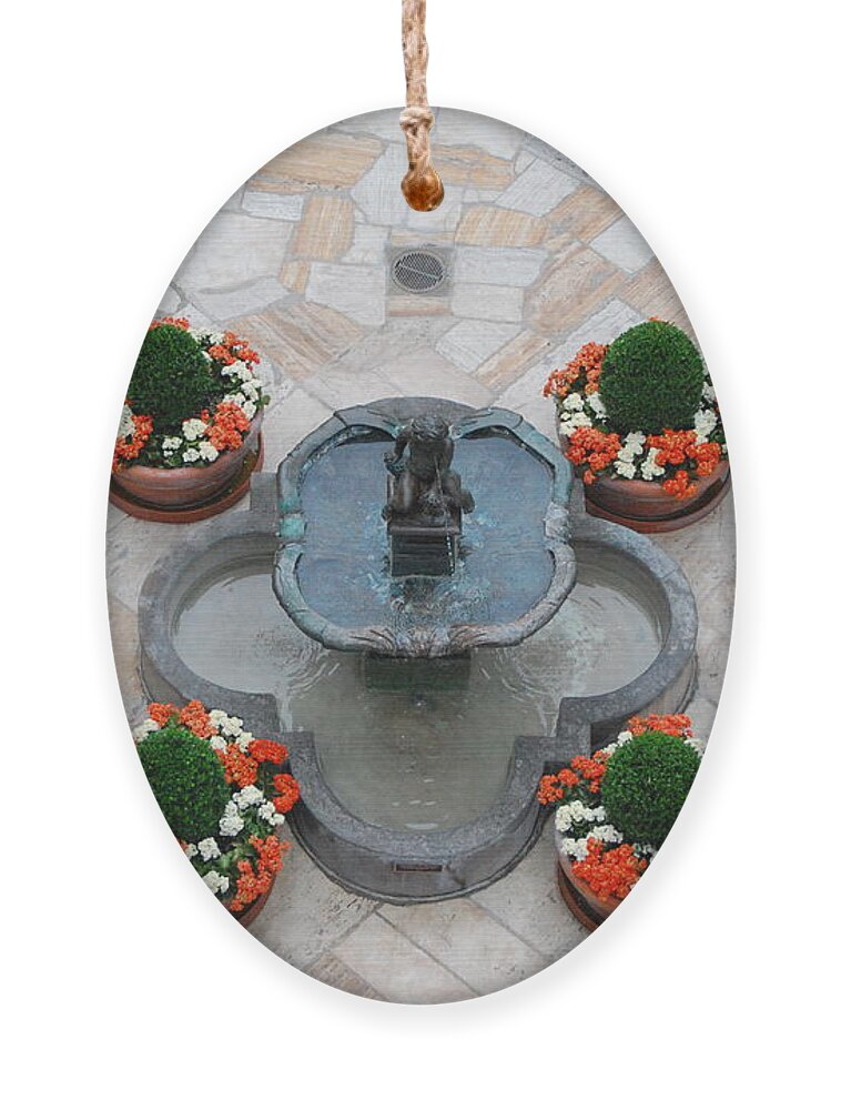 Mission Inn Ornament featuring the photograph Mission Inn Fountain Overview by Amy Fose