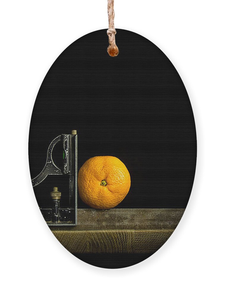 Orange Ornament featuring the photograph Oranges ain't square by Nigel R Bell