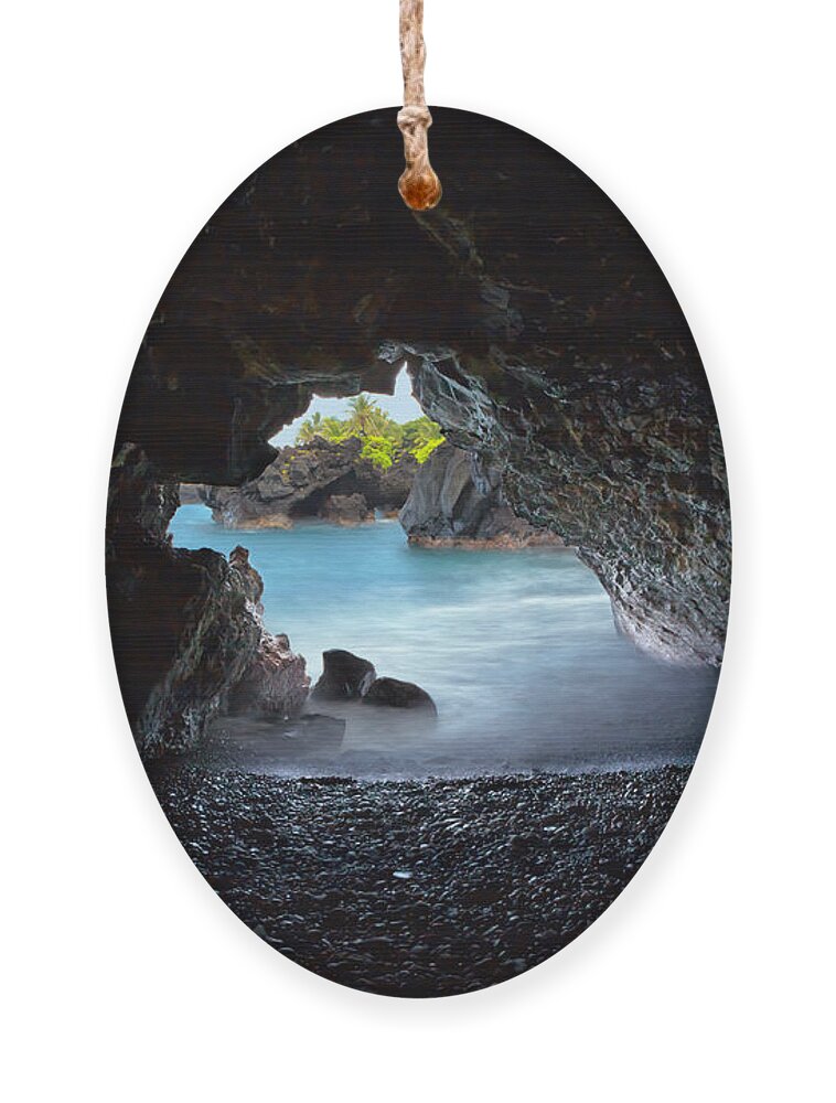 Hana Ornament featuring the photograph Peeking Through the Lava Tube by Susan Rissi Tregoning