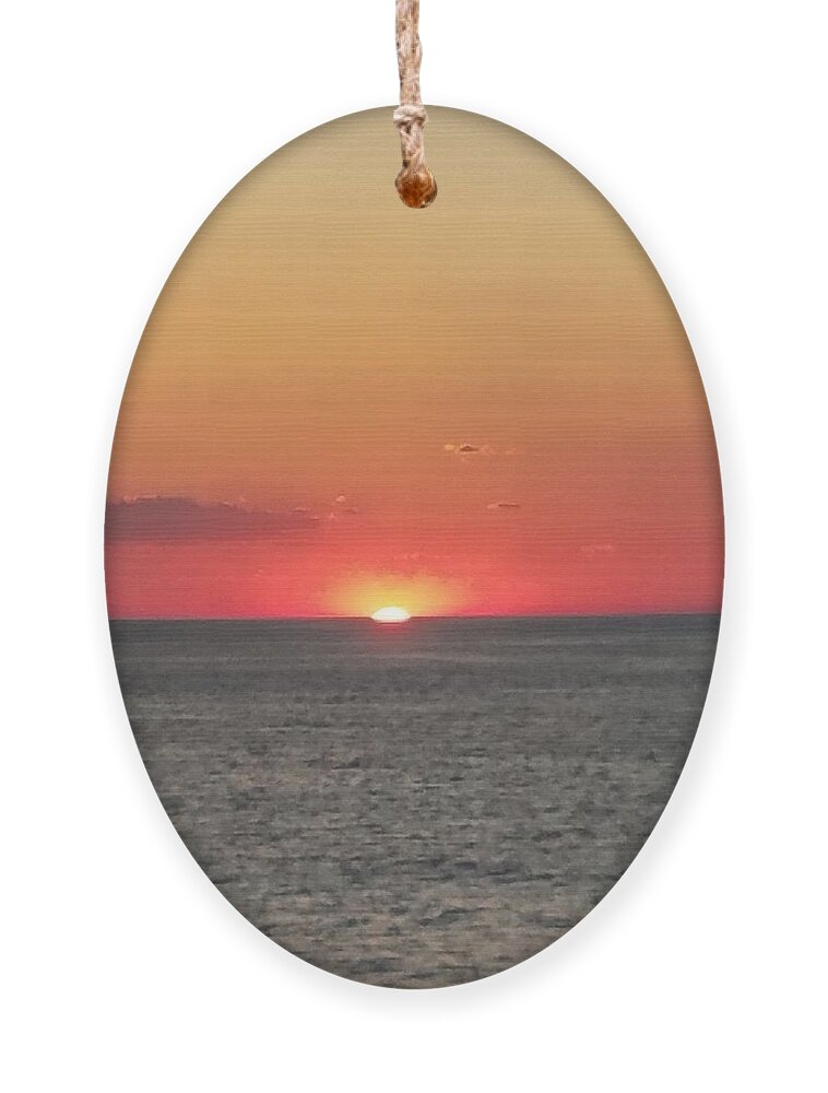 Sunset Ornament featuring the photograph Red Sun Sets Over Ocean by Vic Ritchey