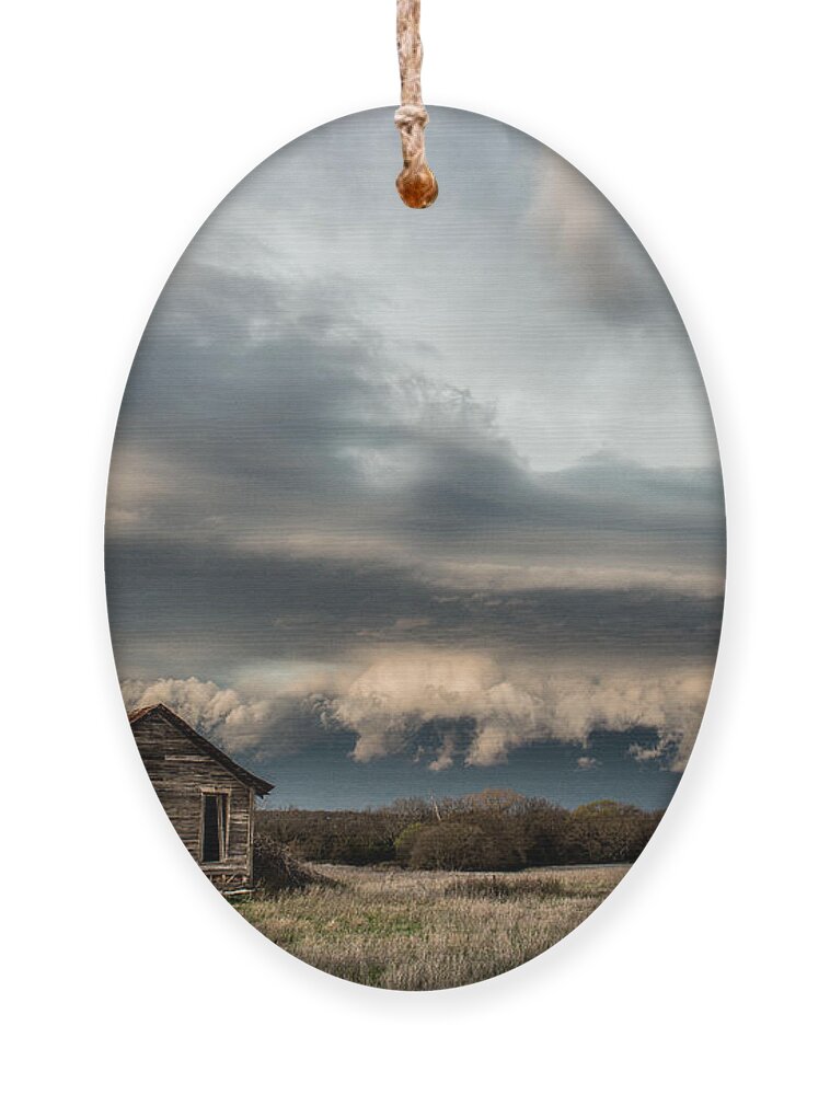 Storm Ornament featuring the photograph Riders on the Storm by Marcus Hustedde