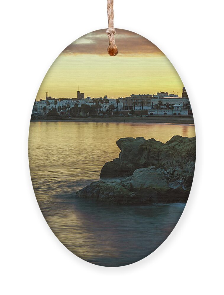 Cadiz Ornament featuring the photograph Rompidillo Beach Rota Spain by Pablo Avanzini