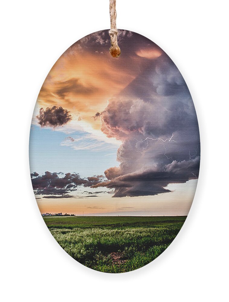 Sunset Ornament featuring the photograph Stormy Sunset by Marcus Hustedde