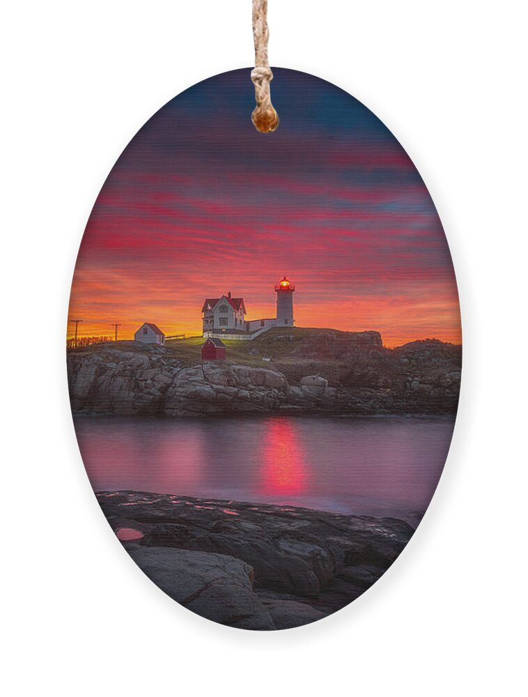 Sunrise Ornament featuring the photograph Sunrise over Nubble Light by Darren White