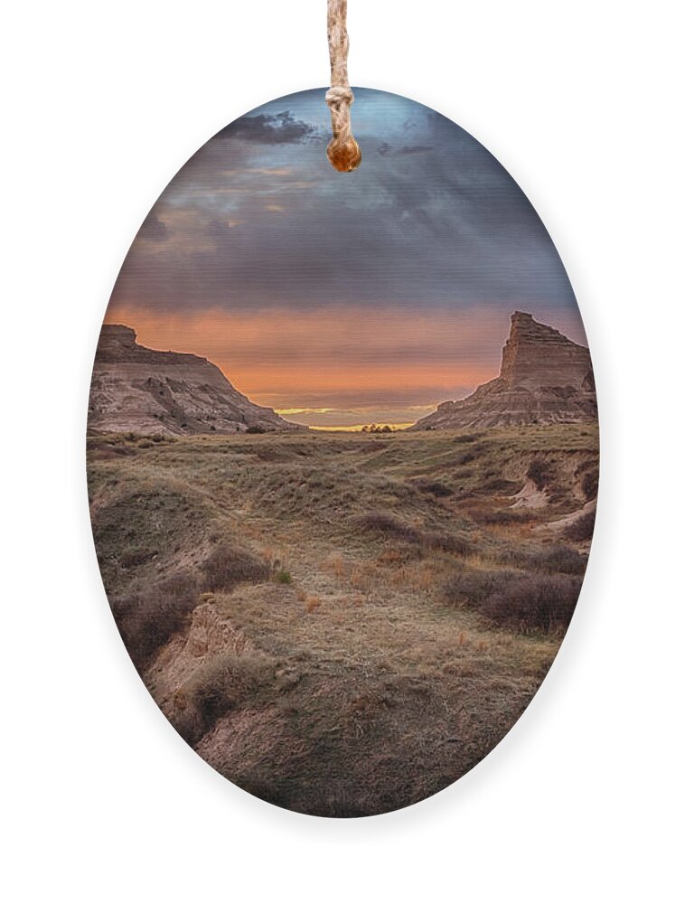 Scotts Bluff Ornament featuring the photograph Sunset at Scotts Bluff by Susan Rissi Tregoning