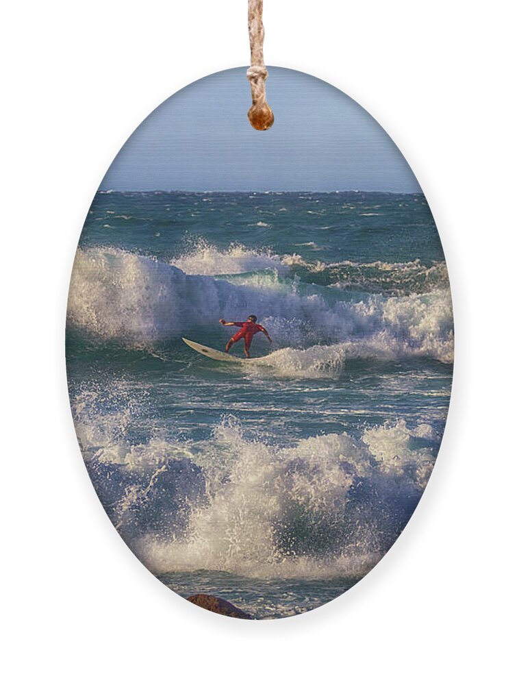 Surfing Ornament featuring the photograph Surfing the Angry Sea by Susan Rissi Tregoning