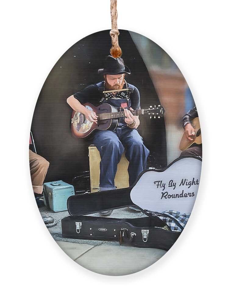 Buskers Ornament featuring the photograph The Fly By Night Rounders by John Haldane