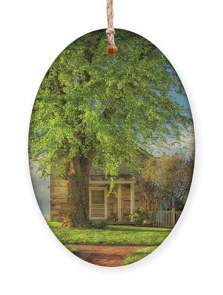 Cottage Ornament featuring the photograph The Stone Cottage On A Spring Evening by Lois Bryan