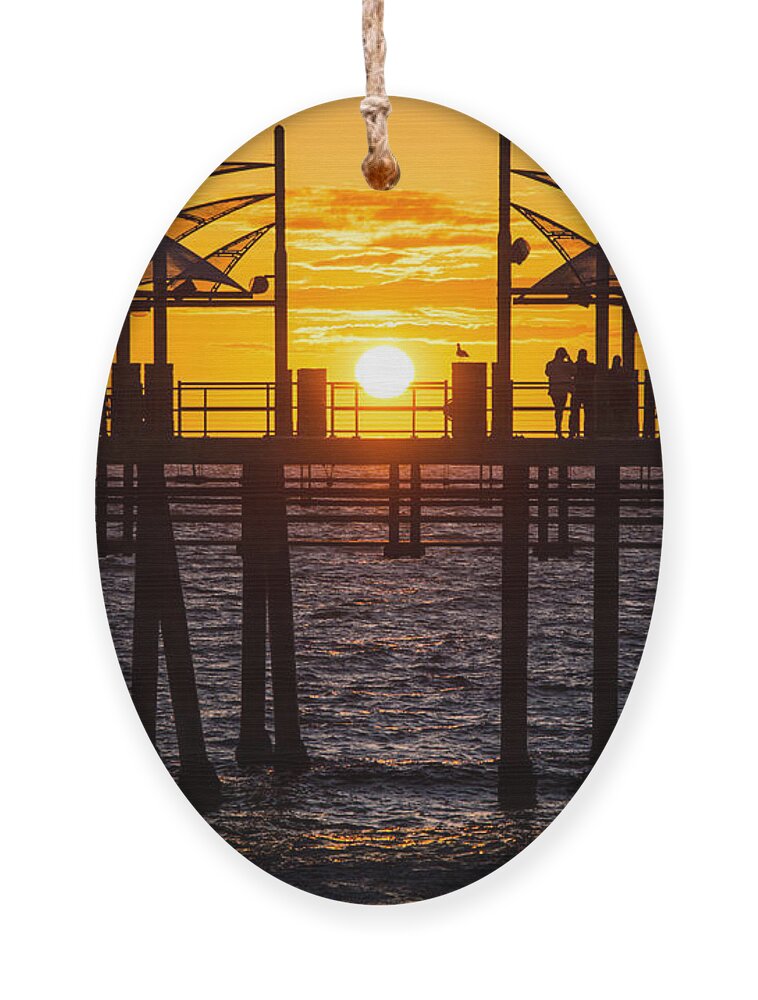 Redondo Beach Ornament featuring the photograph Watching the Sunset by Ed Clark