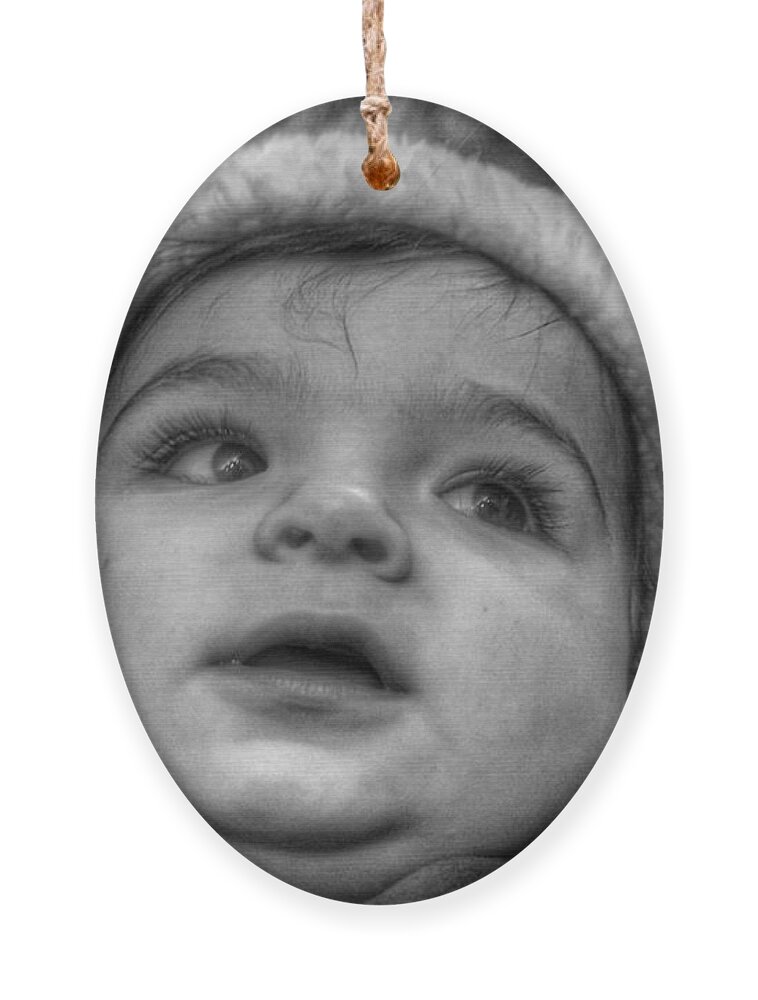 Baby Ornament featuring the photograph Youth in a Fleece Lined Cap by Christopher Lotito