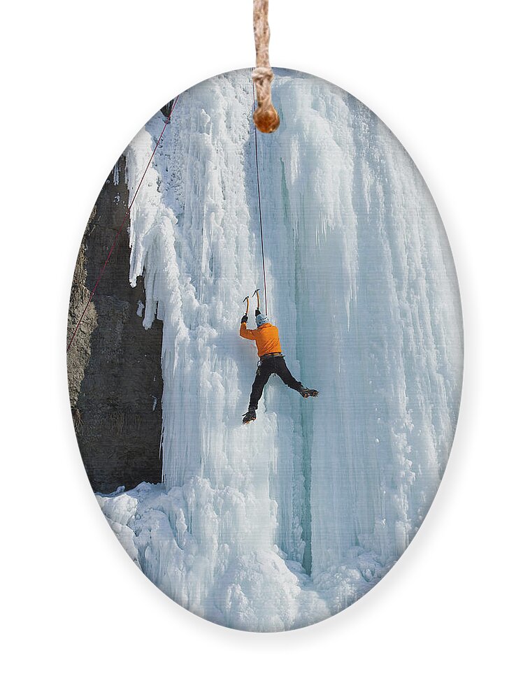 Alps Ornament featuring the photograph Ice Climbing The Waterfall by Vitalii Nesterchuk