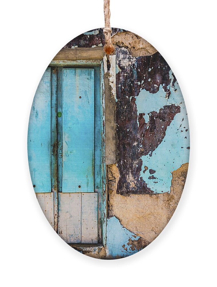 Wall Ornament featuring the photograph Blue wall and door by Lyl Dil Creations
