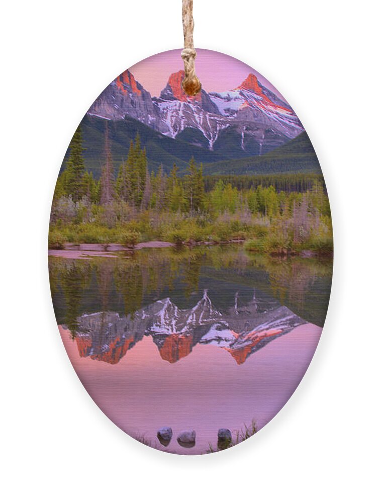 Three Sisters Ornament featuring the photograph Canmore Brilliant Sunrise by Adam Jewell