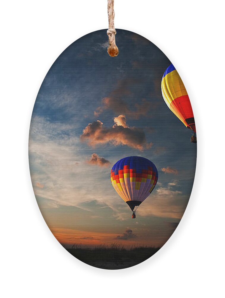 Flight Ornament featuring the photograph Colorful Hot Air Balloon Is Flying by Rozbyshaka