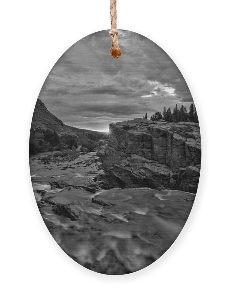 Swiftcurrent Falls Ornament featuring the photograph First Sunlight Over Swiftcurrent Falls Black And White by Adam Jewell