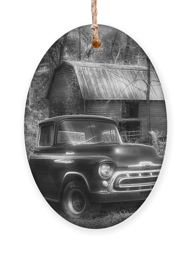 1957 Ornament featuring the photograph Love that Black and White 1957 Chevy Truck by Debra and Dave Vanderlaan