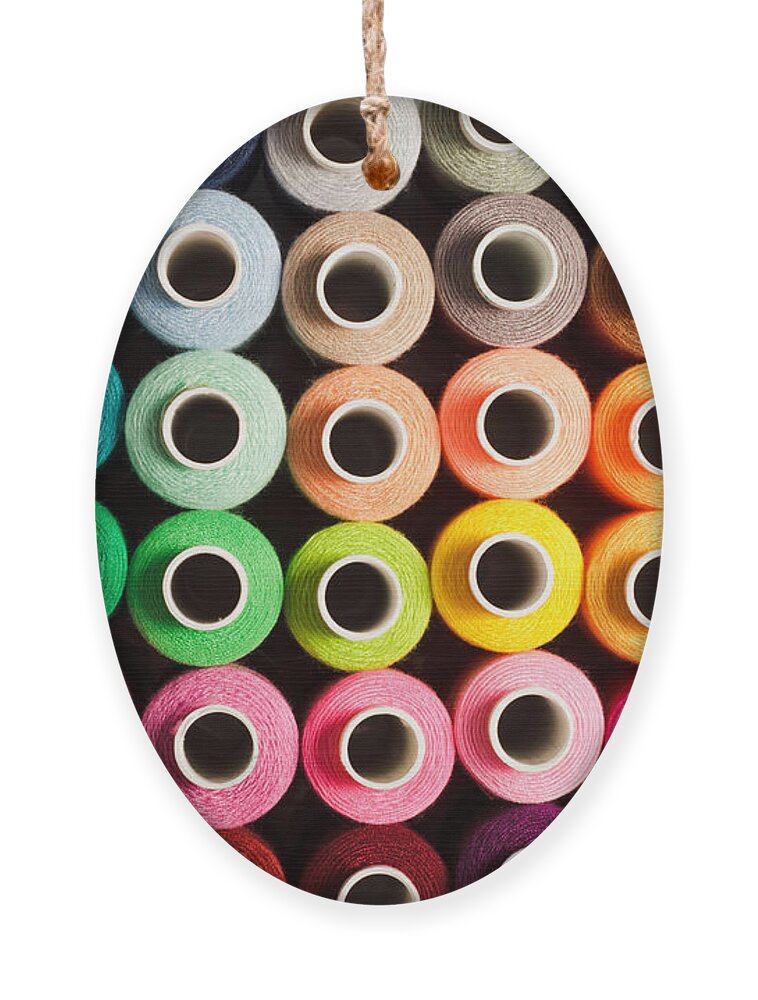 Silky Ornament featuring the photograph Sewing Threads As A Multicolored by Oksana Shufrych