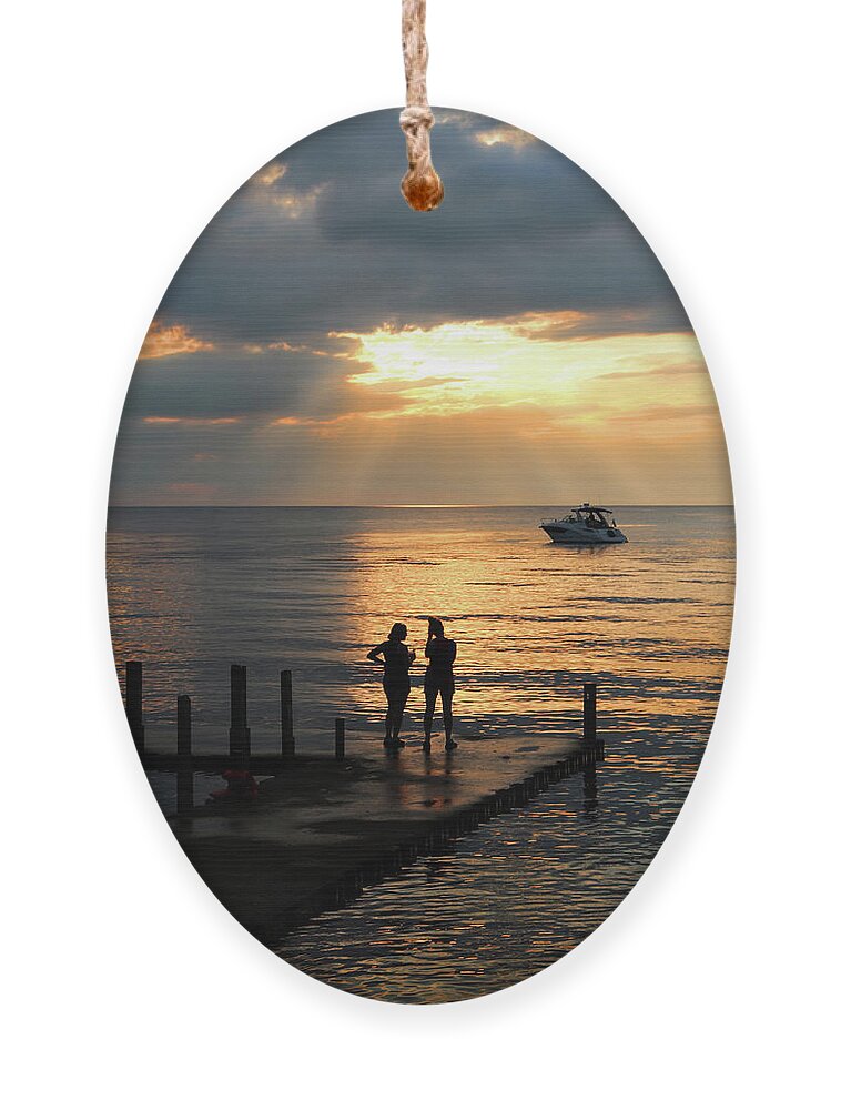 Sunset Conversation Ornament featuring the photograph Sunset Conversation by David T Wilkinson