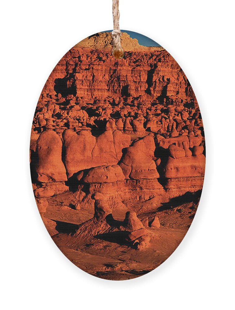 North America Ornament featuring the photograph Sunset Light Turns The Hoodoos Blood Red In Goblin Valley State Park Utah by Dave Welling