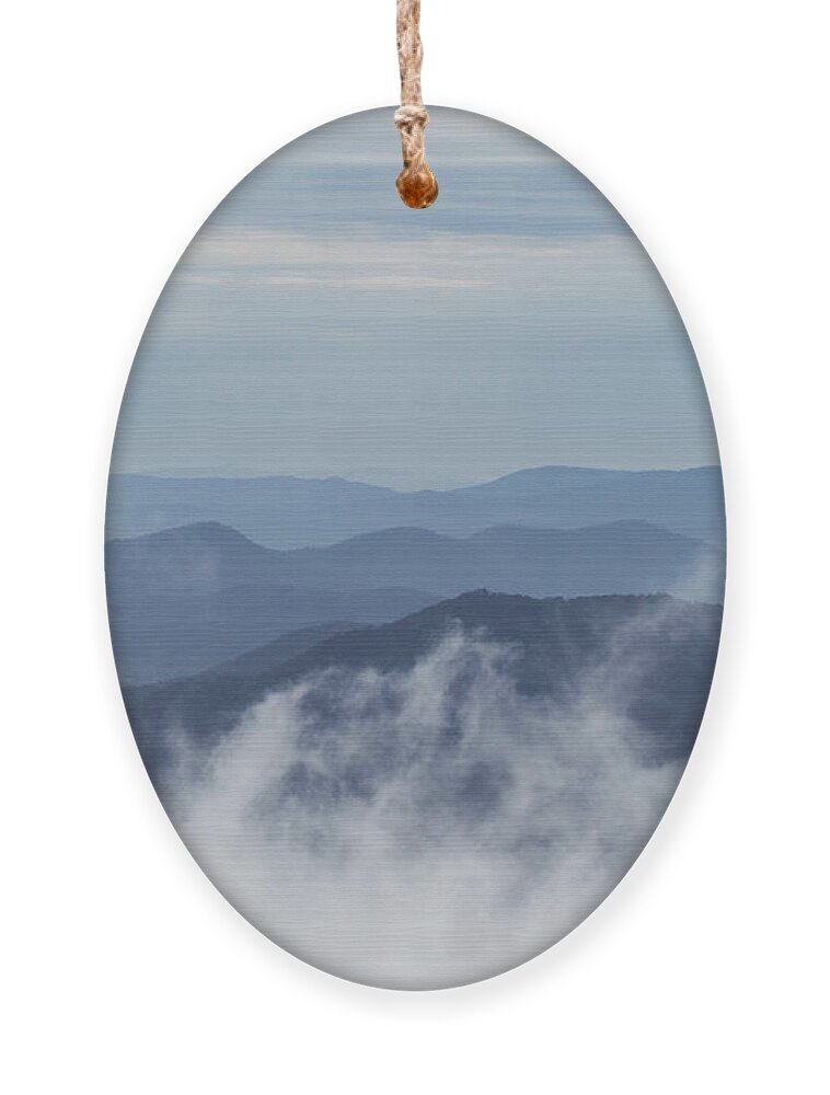 Mountain Ornament featuring the photograph Above the Clouds #1 by Linda Lees