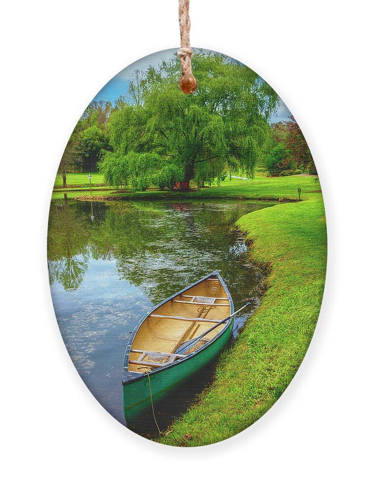 Boats Ornament featuring the photograph Canoe in Spring #1 by Debra and Dave Vanderlaan
