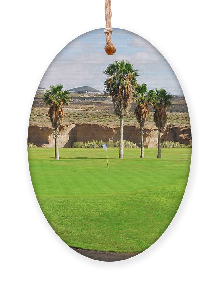 Background Ornament featuring the photograph Golf course in Tenerife island, Canary islands #1 by Severija Kirilovaite
