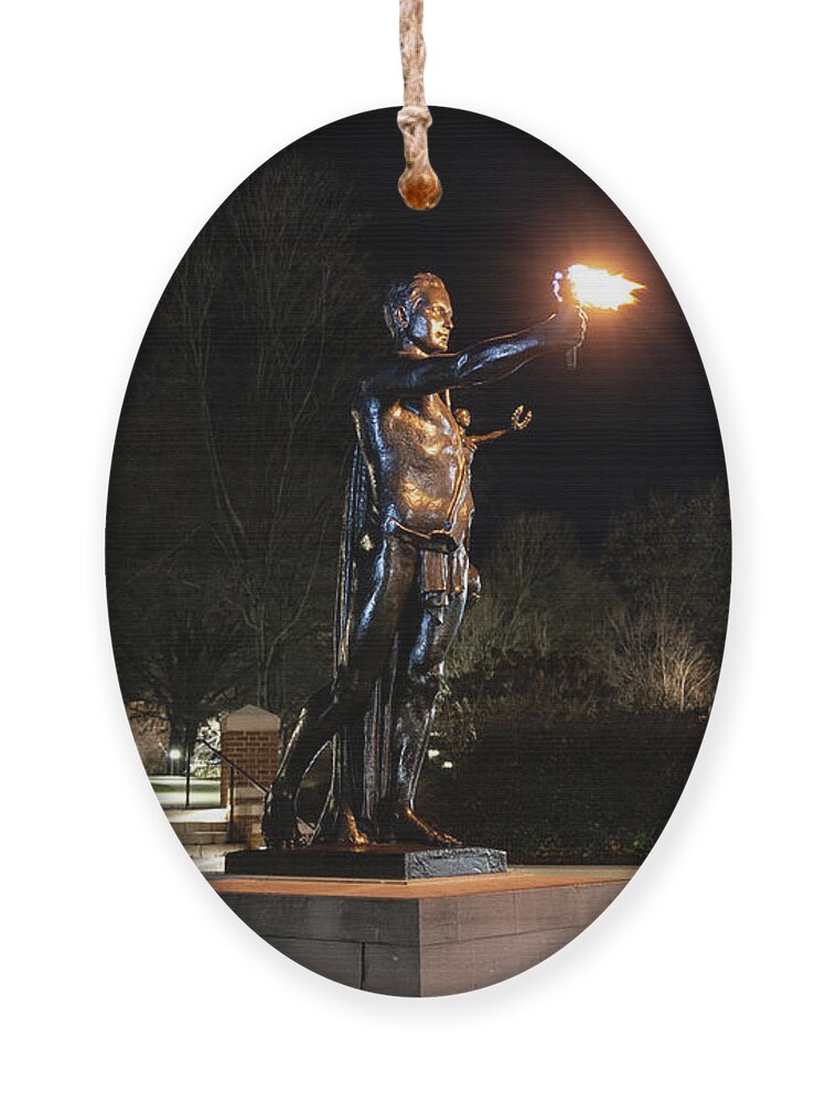 University Of Tennessee At Night Ornament featuring the photograph Torchbearer statue at the University of Tennessee at night by Eldon McGraw