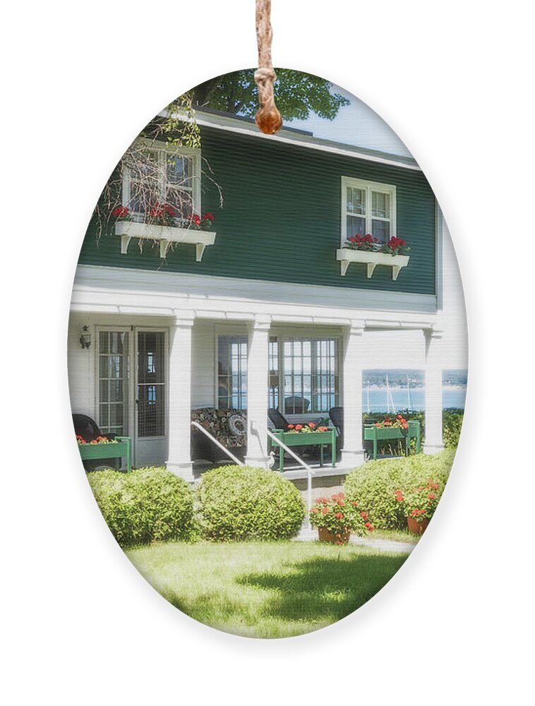 Bay View Ornament featuring the photograph A Cottage on the Bay With Radiance by Robert Carter