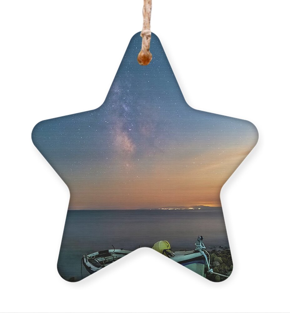 Milky Way Ornament featuring the photograph A Fishing Boat under the Milky Way by Alexios Ntounas