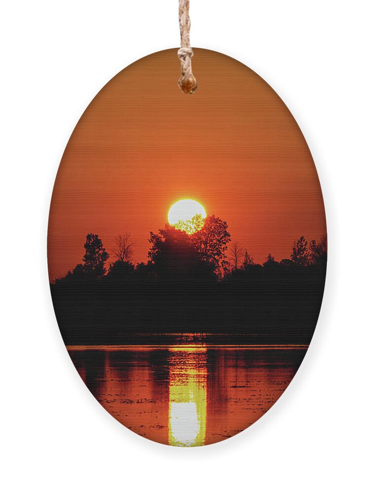 Sunset Ornament featuring the photograph A Kayaker's Sunset by Wild Fotos