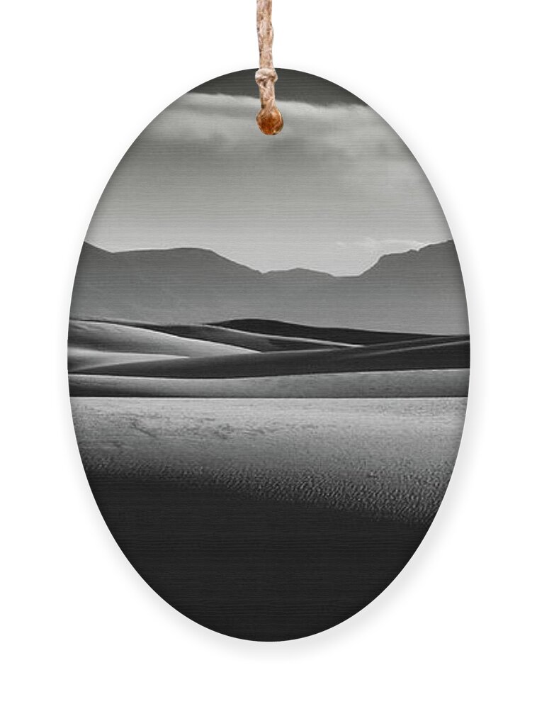 White Sands Ornament featuring the photograph A Man Alone by Mark Gomez