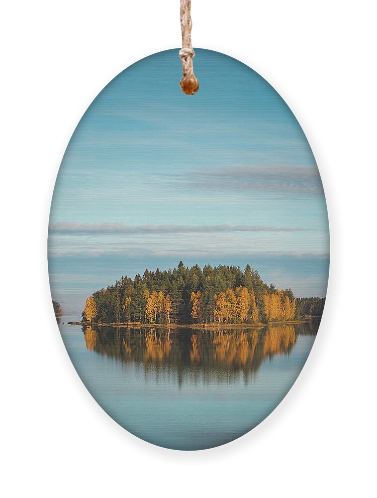 Admire Ornament featuring the photograph Autumn coloured island in the middle of the lake by Vaclav Sonnek