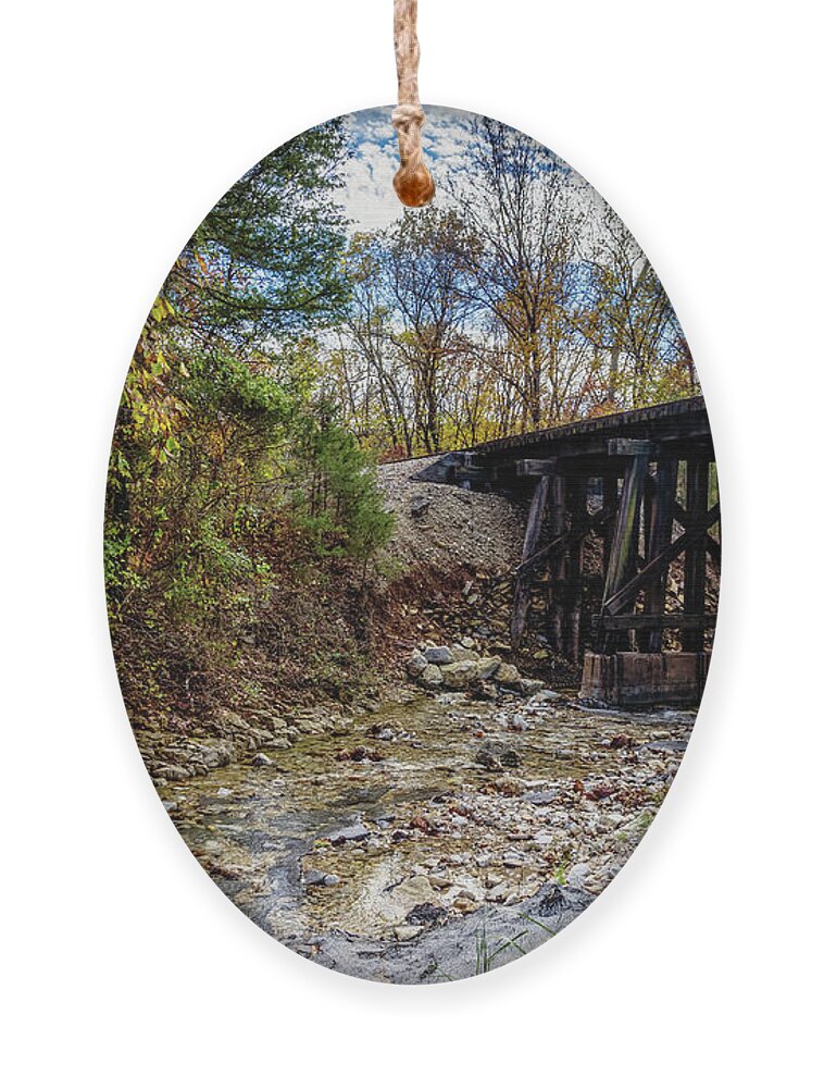 Branson Mo Ornament featuring the photograph Autumn Railroad Bridge by Jennifer White