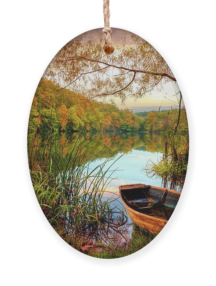 Carolina Ornament featuring the photograph Autumn Rowboat by Debra and Dave Vanderlaan