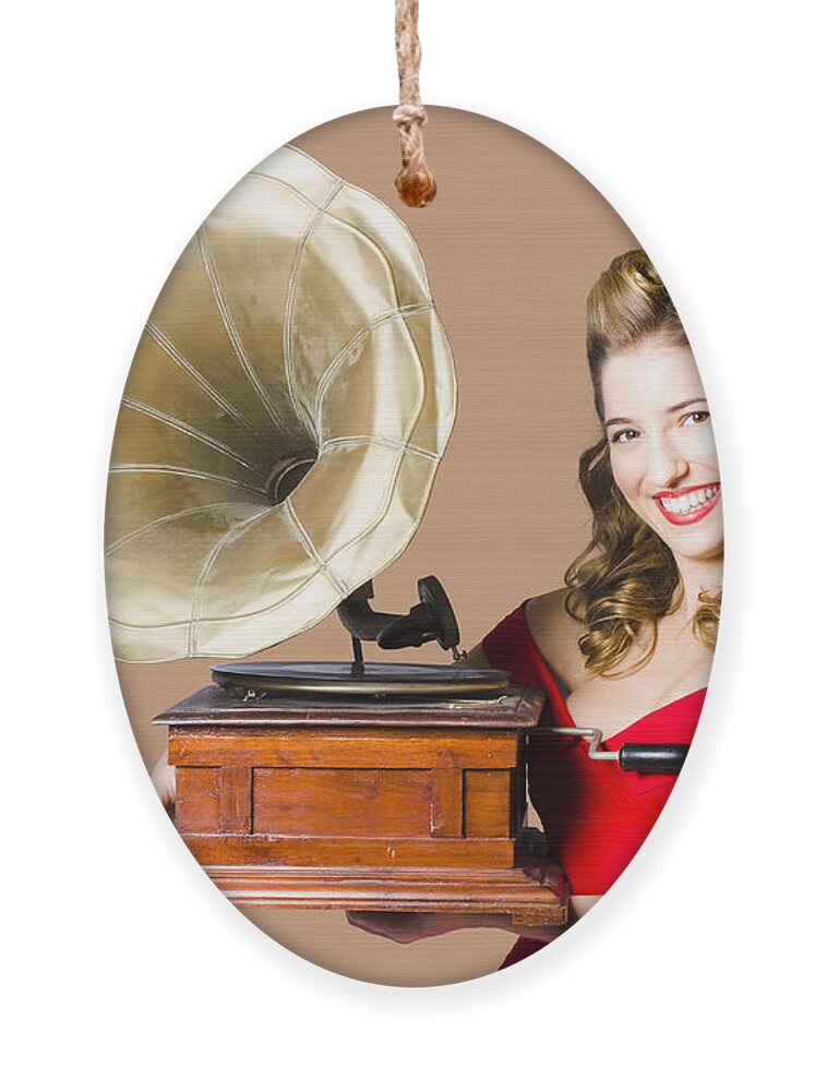Diner Ornament featuring the photograph Beautiful disco diner pinup with gramophone by Jorgo Photography