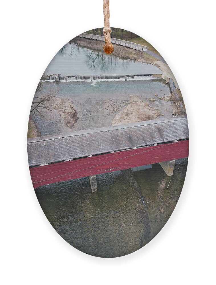 Above Ornament featuring the photograph Birdseye View Wehrs Dam and the Covered Bridge in March by Jason Fink