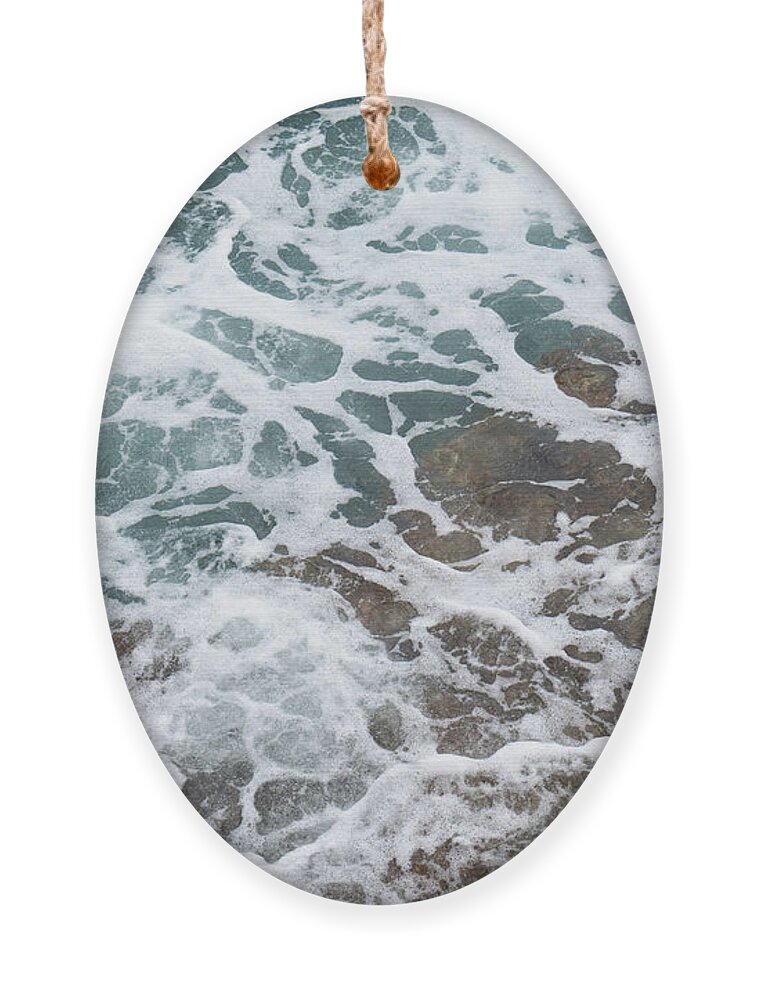 Sea Water Ornament featuring the photograph Blue sea water flows over the rocks 3 by Adriana Mueller